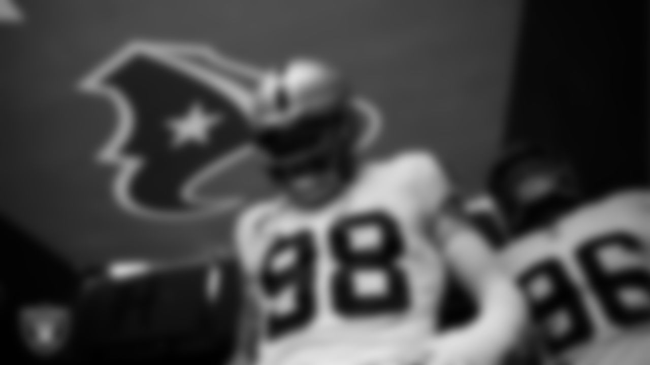Las Vegas Raiders defensive end Maxx Crosby (98) waits for the team to be introduced onto the field before the regular season away game against the Houston Texans at NRG Stadium.