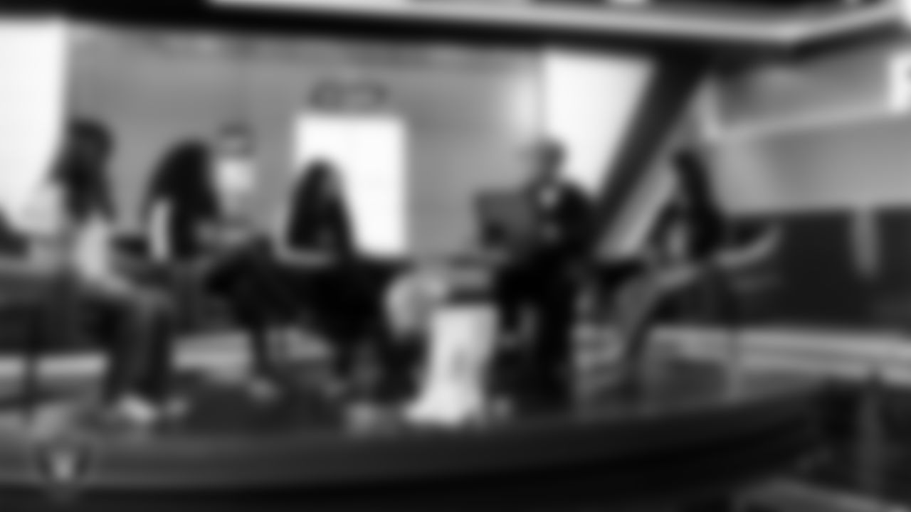 Raiderettes Shayla and Kylee meet with representatives from Hope Means Nevada and designers to design custom boots for the NFL's My Cause My Cleats initiative in Cox Studios at Intermountain Health Performance Center.