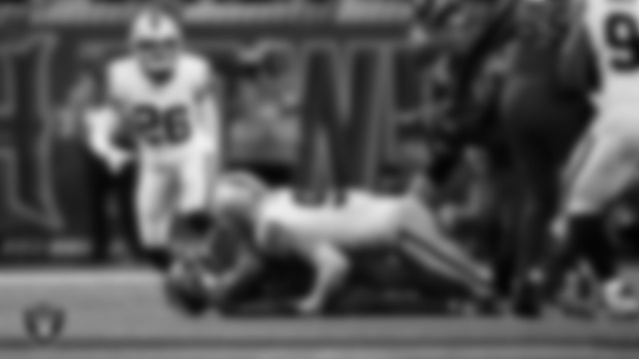Las Vegas Raiders defensive end Maxx Crosby (98) makes a tackle during the regular season away game against the Houston Texans at NRG Stadium.