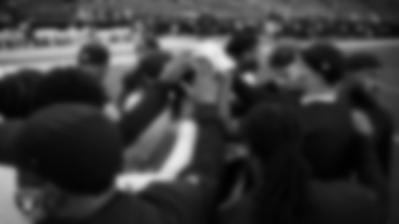 The Las Vegas Raiders defensive backs huddle before the regular season home game against the New York Giants at Allegiant Stadium.
