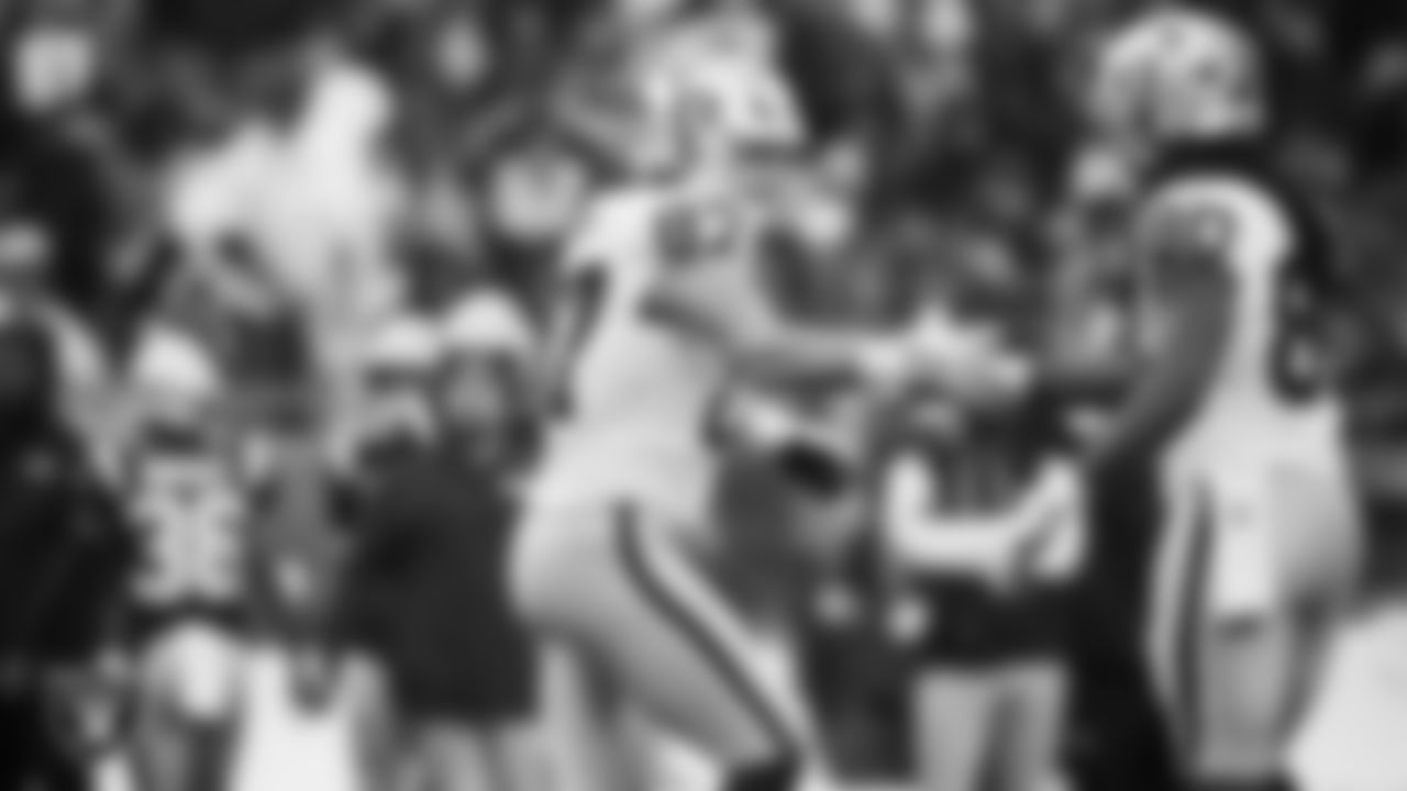 Las Vegas Raiders tight end Michael Mayer (87) and tight end Ian Thomas (80) high-five on the field during the regular season away game against the New England Patriots at Gillette Stadium.