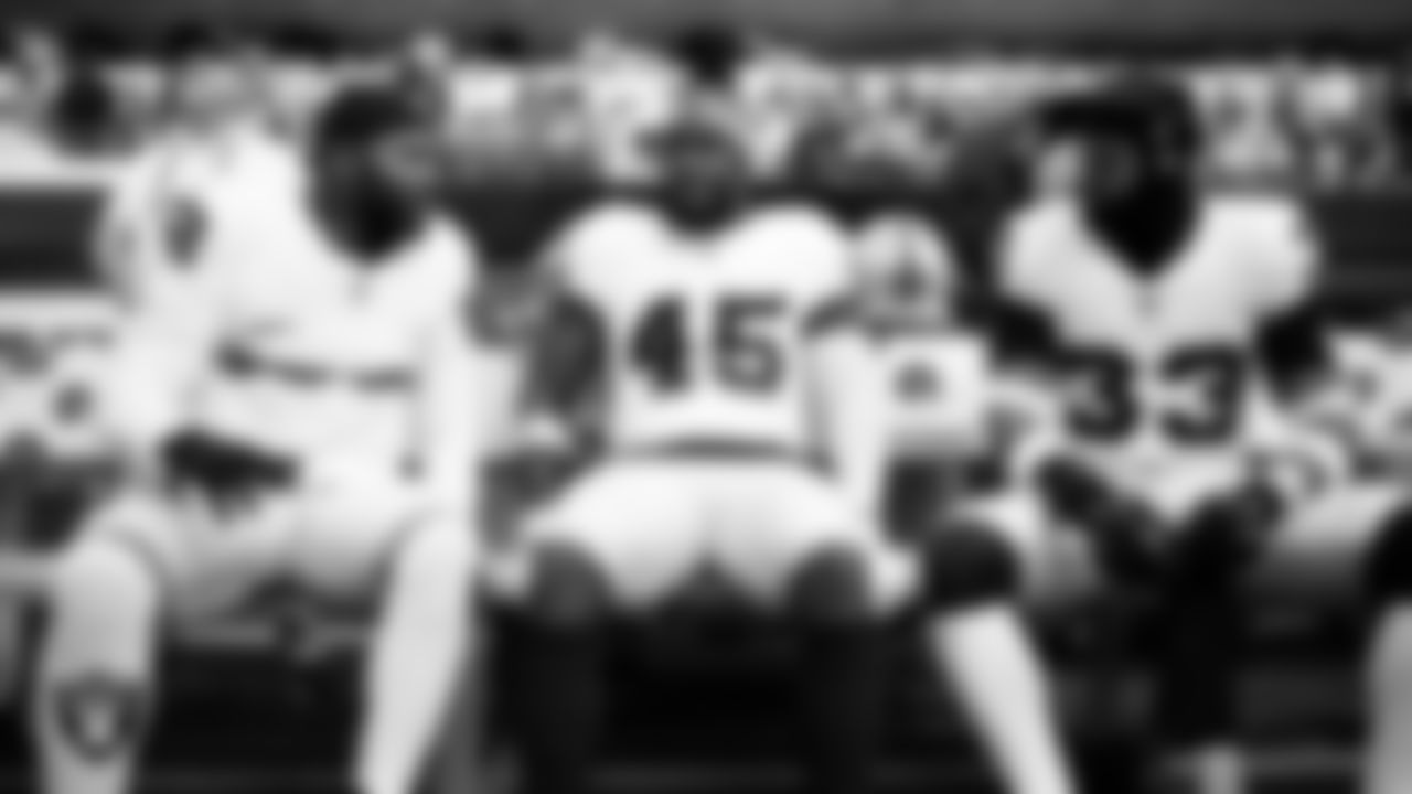 Las Vegas Raiders linebacker Elandon Roberts (52), linebacker Devin White (45) and linebacker Jamal Adams (33) on the bench before the regular season away game against the Los Angeles Chargers at SoFi Stadium.