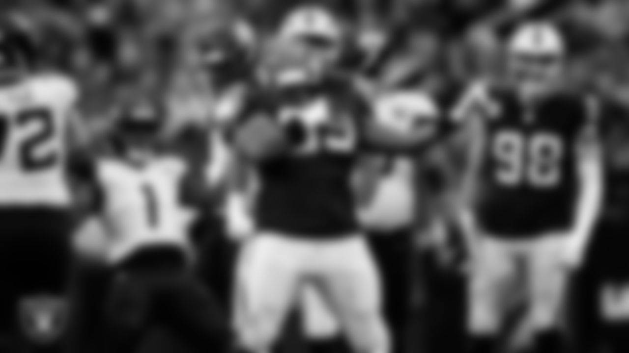 Las Vegas Raiders defensive tackle Adam Butler (69) celebrates after making a tackle during the regular season home game against the Jacksonville Jaguars at Allegiant Stadium.