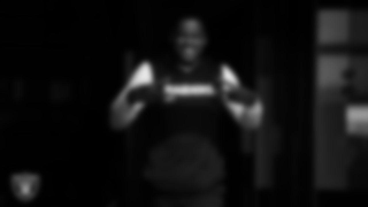 Las Vegas Raiders defensive assistant/linebackers coach Ty McKenzie walks out to the field for practice at Intermountain Health Performance Center.