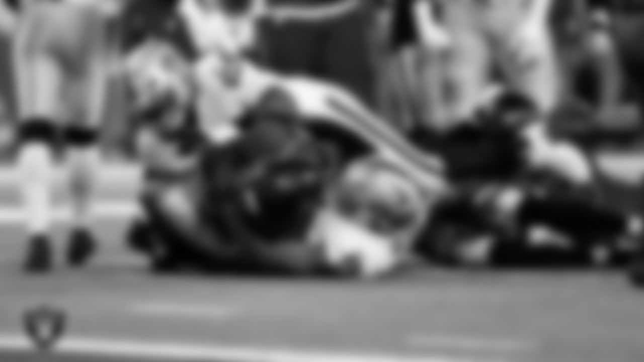 Las Vegas Raiders defensive tackle Adam Butler (69) and defensive end Tyree Wilson (9) during the regular season away game against the Houston Texans at NRG Stadium.