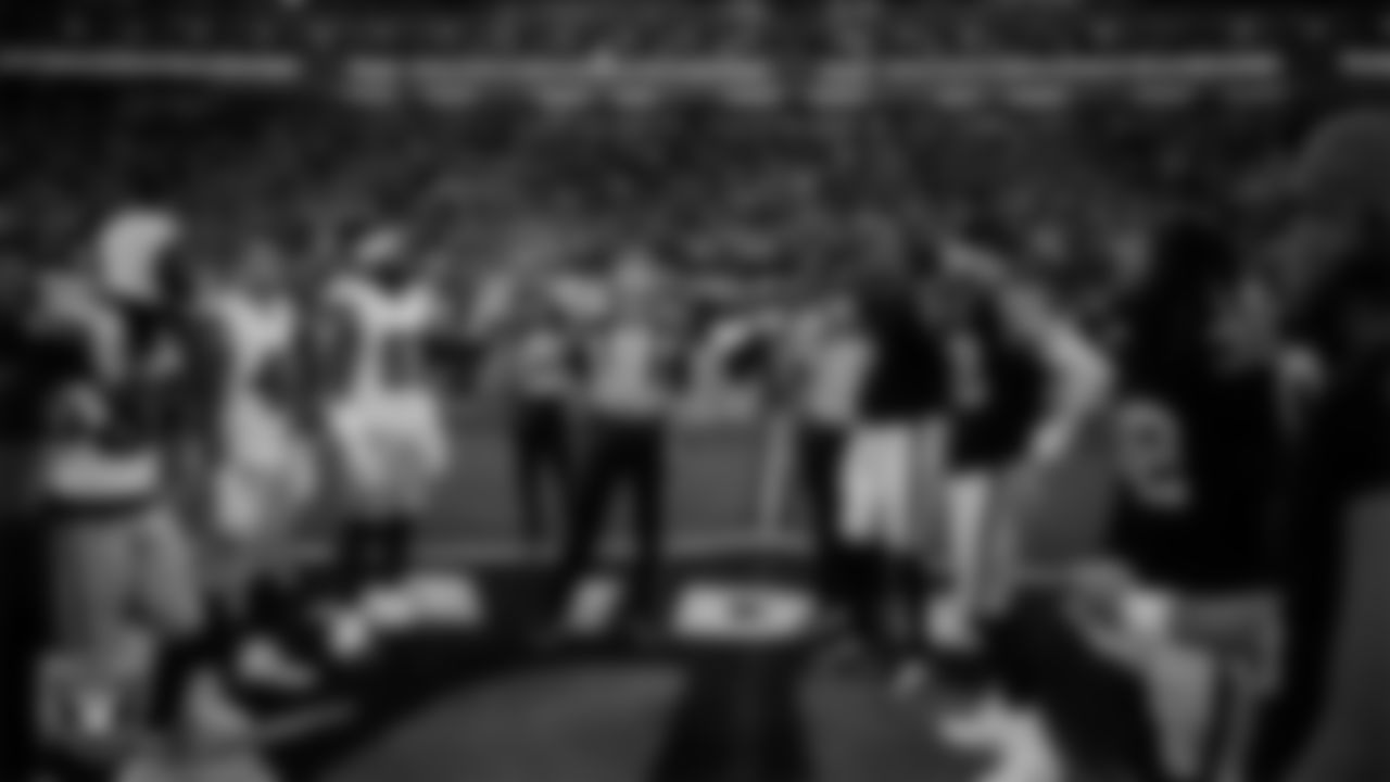 The Las Vegas Raiders during the coin toss before the regular season home game against the Dallas Cowboys at Allegiant Stadium.