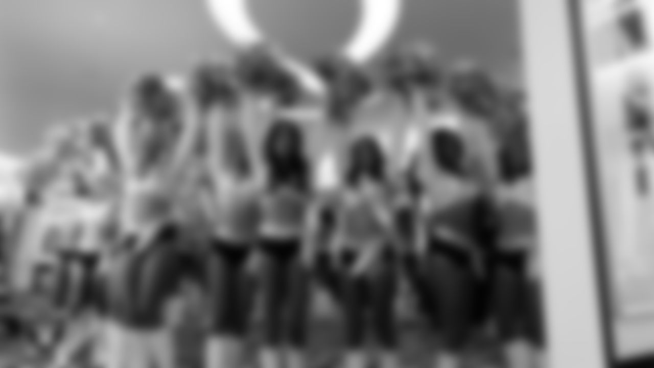 The Raiderettes huddle in the locker room before the regular season home game against the Denver Broncos at Allegiant Stadium.