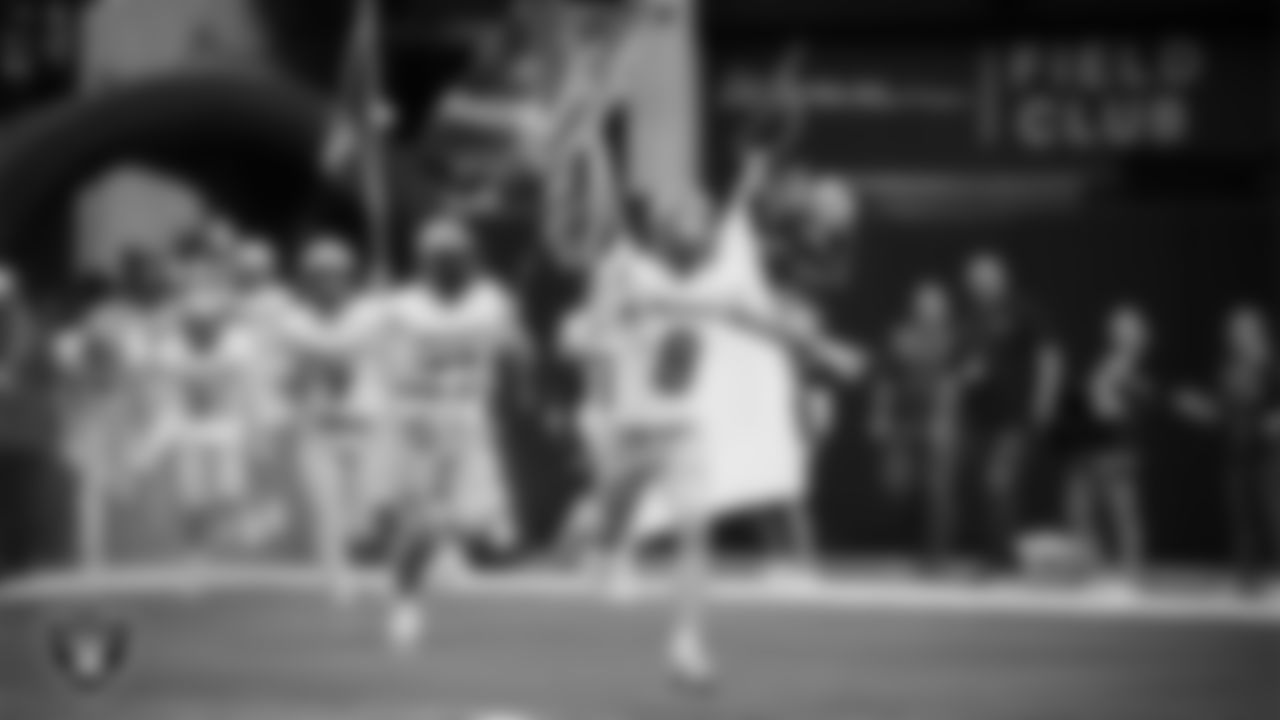 The McQueen High School football team takes the field before the NIAA 4A Division State Championship game against Pinecrest Academy - Sloan Canyon at Allegiant Stadium.