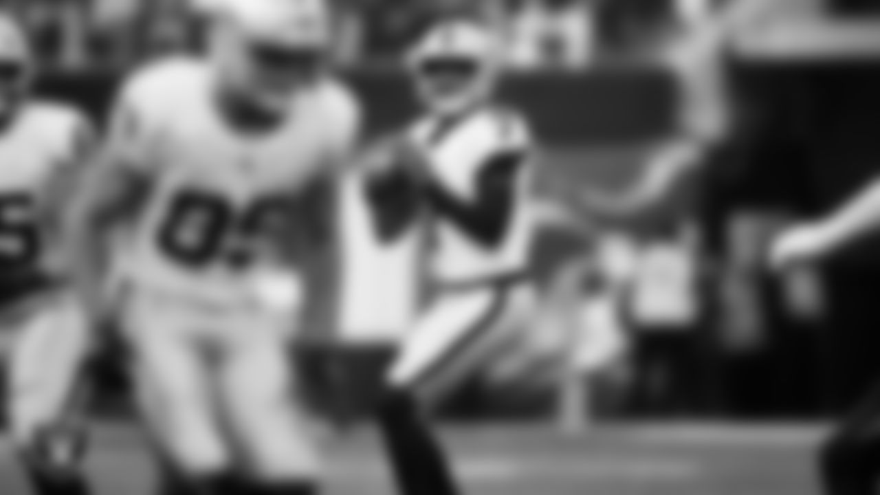 Las Vegas Raiders quarterback Geno Smith (7) looks for a receiver during the regular season away game against the Los Angeles Chargers at SoFi Stadium.