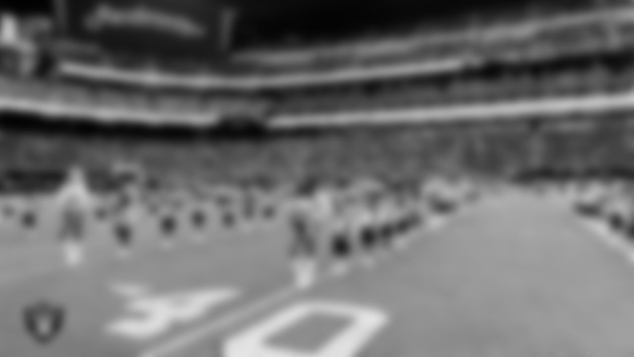 The Raiderettes and Junior Raiderettes perform on the field before the preseason home game against the San Francisco 49ers at Allegiant Stadium.