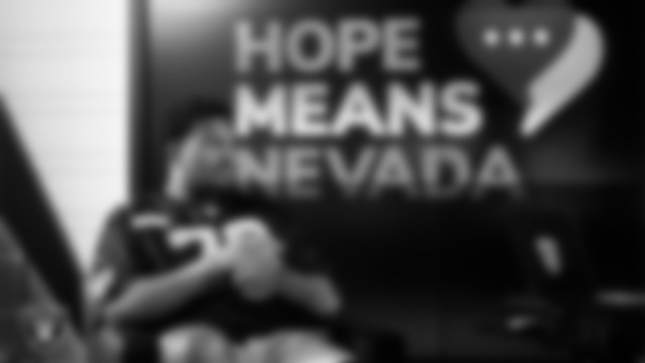 Las Vegas Raiders guard Caleb Rogers (76) works with representatives from Hope Means Nevada and designers to design cleats for My Cause My Cleats in Cox Studios at Intermountain Health Performance Center.