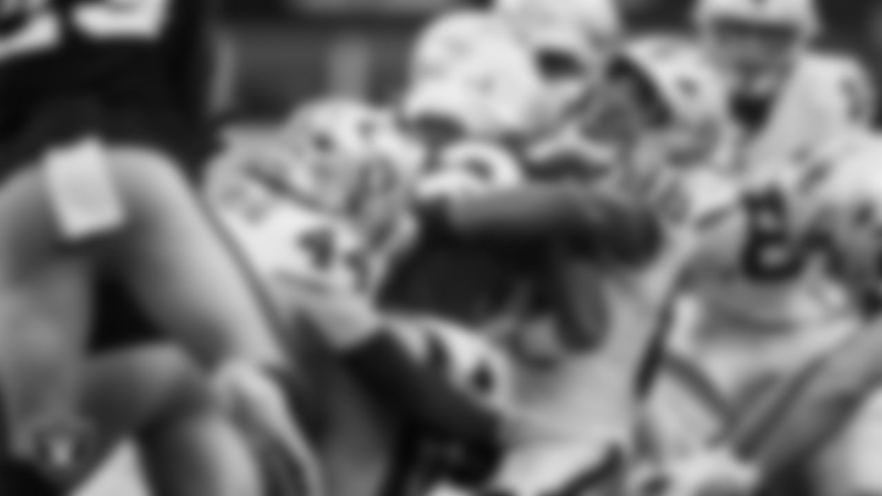 Las Vegas Raiders linebacker Tommy Eichenberg (44) and wide receiver Justin Shorter (88) make a tackle during the regular season away game against the New England Patriots at Gillette Stadium.