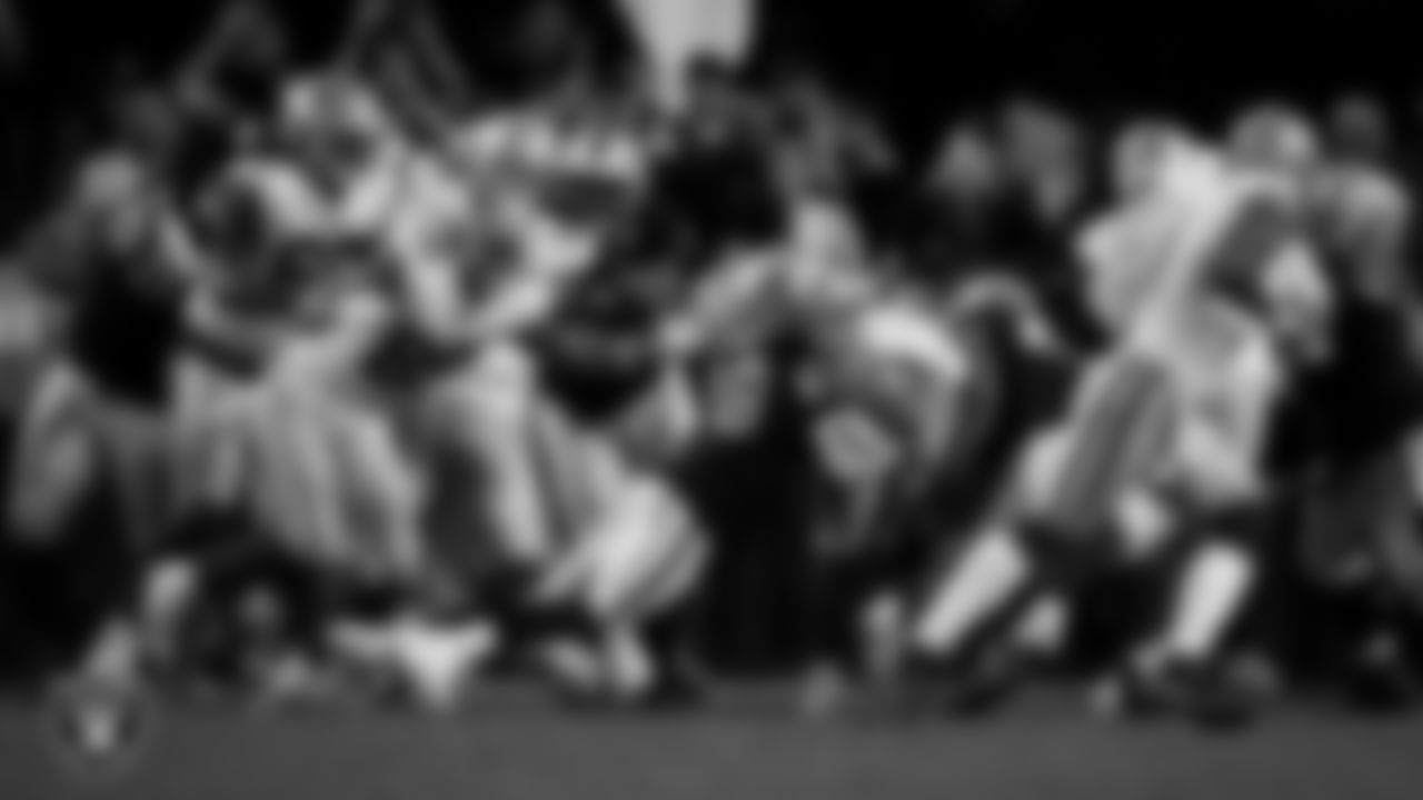 Las Vegas Raiders defensive end Maxx Crosby (98) makes a tackle during the regular season home game against the Dallas Cowboys at Allegiant Stadium.