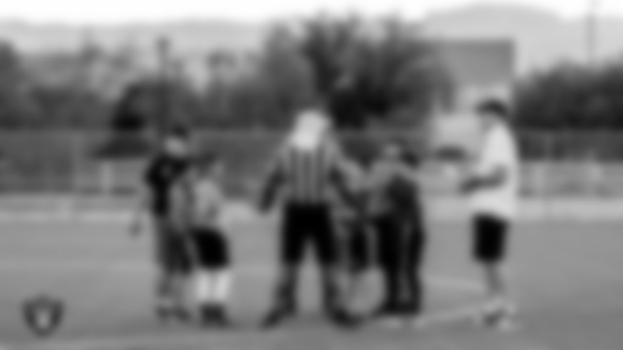 Athletes during a coin toss before a Silver and Black League championship game at Teton Trails Soccer Complex.