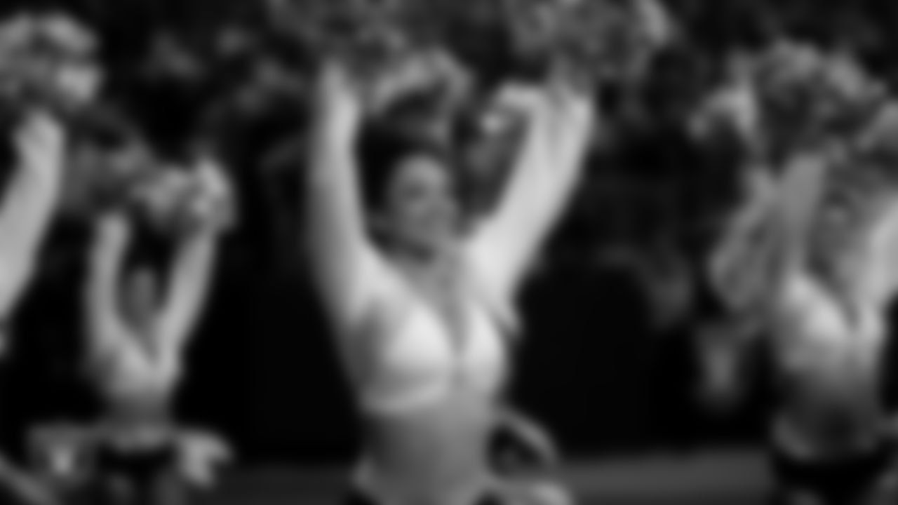 Raiderette Makenna walks onto the field for a performance during the regular season home game against the Cleveland Browns at Allegiant Stadium.