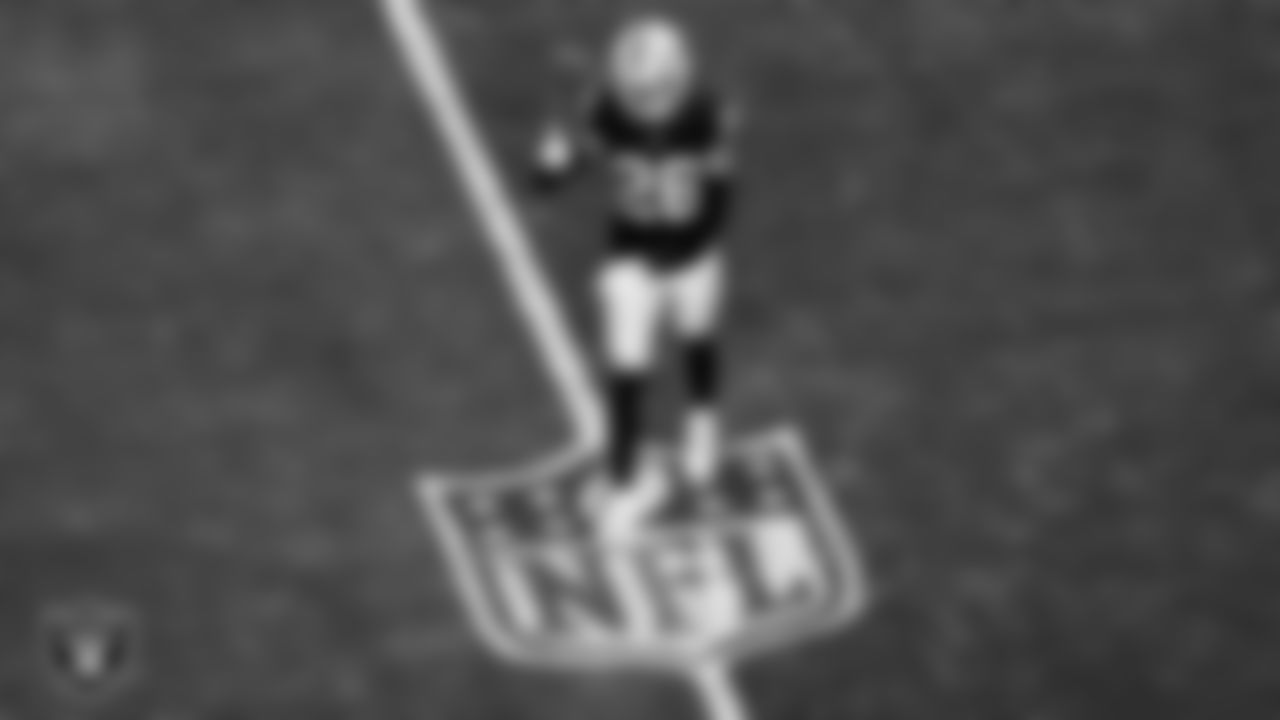 Las Vegas Raiders cornerback Darien Porter (26) celebrates after breaking up a pass during the regular season home game against the Denver Broncos at Allegiant Stadium.