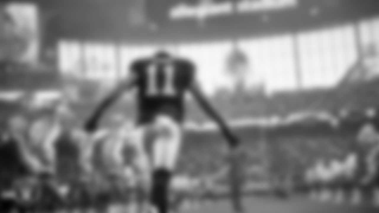 Las Vegas Raiders safety Jeremy Chinn (11) is introduced onto the field before the regular season home game against the Denver Broncos at Allegiant Stadium.