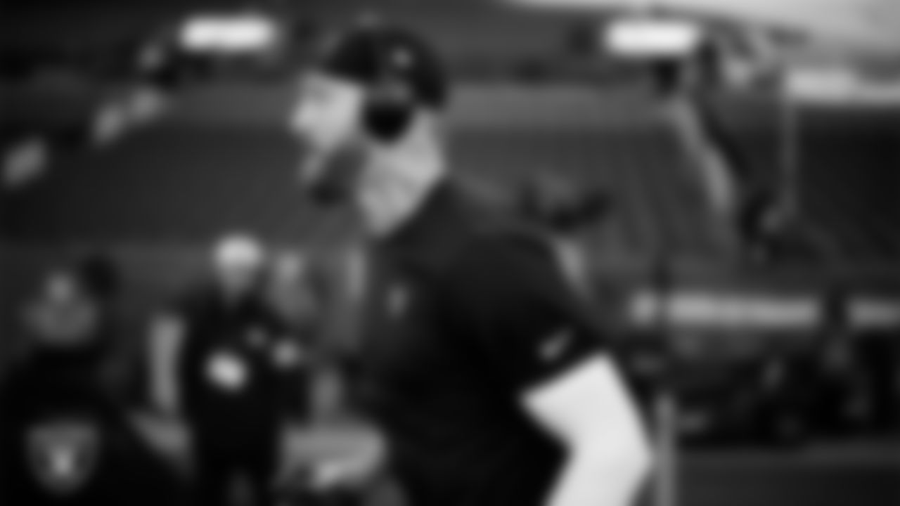 Las Vegas Raiders defensive end Maxx Crosby (98) warming up before the regular season away game against the Denver Broncos at Empower Field at Mile High.