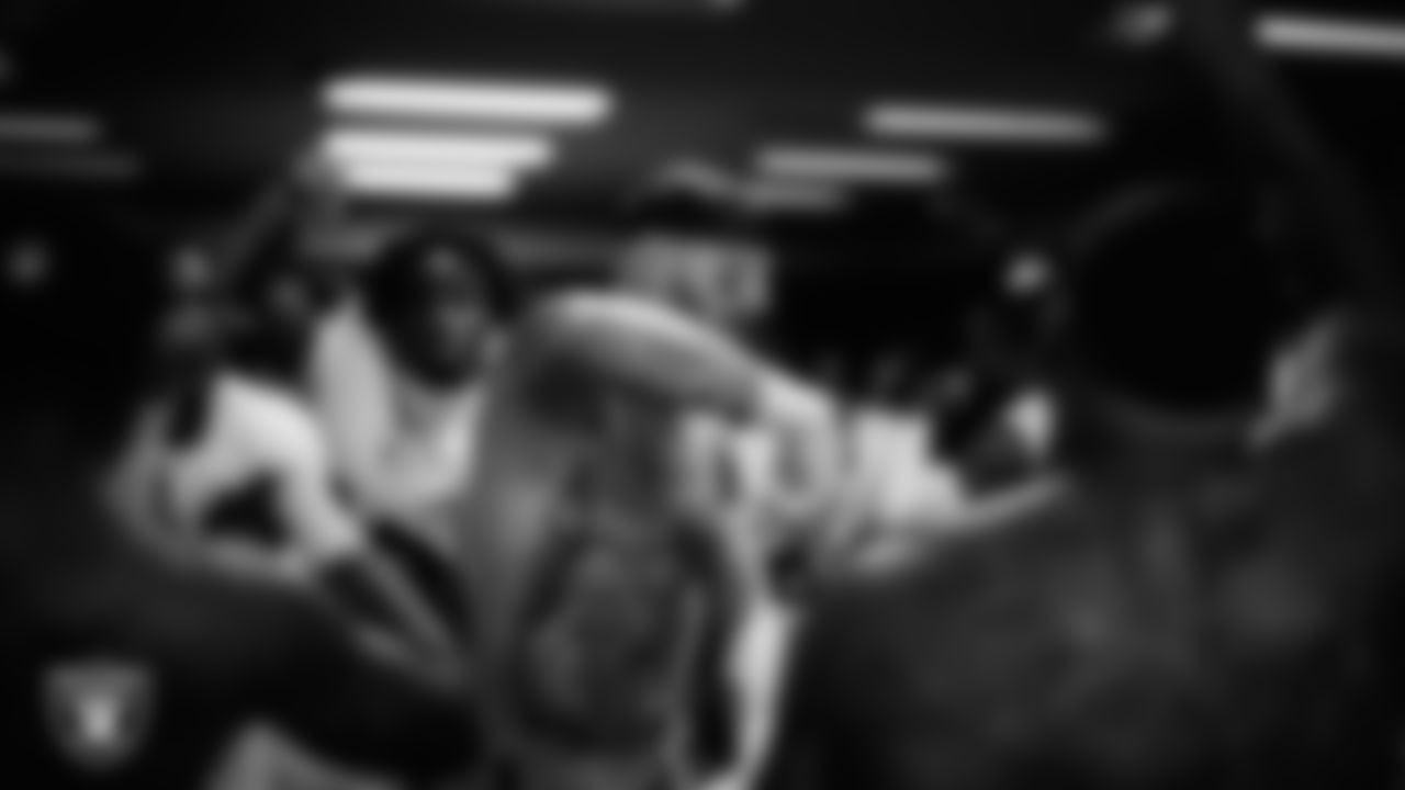 Las Vegas Raiders defensive end Maxx Crosby (98) in the locker room after the regular season away game against the New England Patriots at Gillette Stadium.
