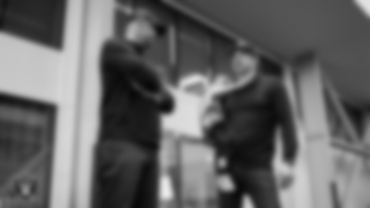 Las Vegas Raiders General Manager John Spytek and Head Coach Klint Kubiak on the indoor field at Intermountain Health Performance Center.