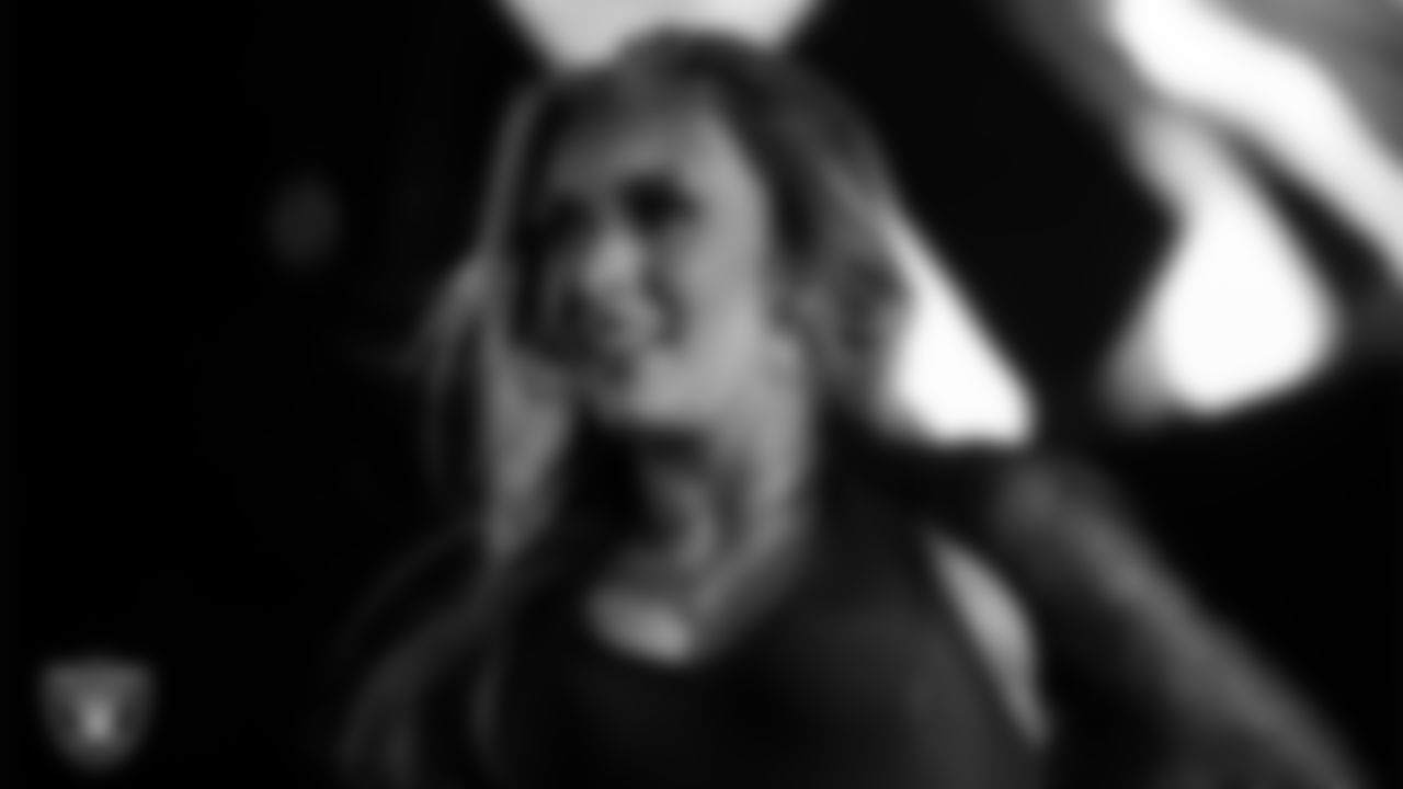 Raiderette Shelby performs with Rapper Nelly at halftime during the regular season home game against the Dallas Cowboys at Allegiant Stadium.