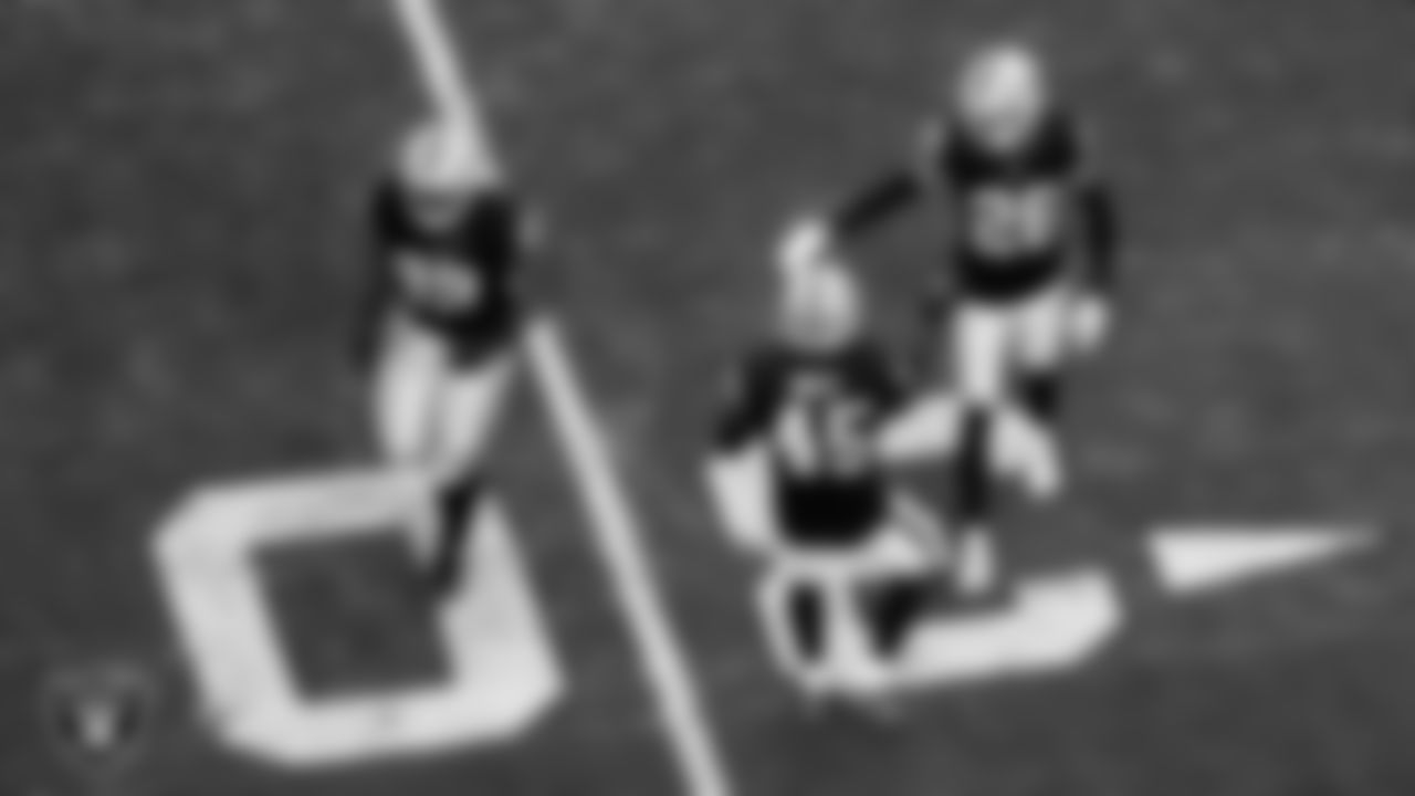 Las Vegas Raiders cornerback Darien Porter (26) celebrates with linebacker Devin White (45) after breaking up a pass during the regular season home game against the Denver Broncos at Allegiant Stadium.