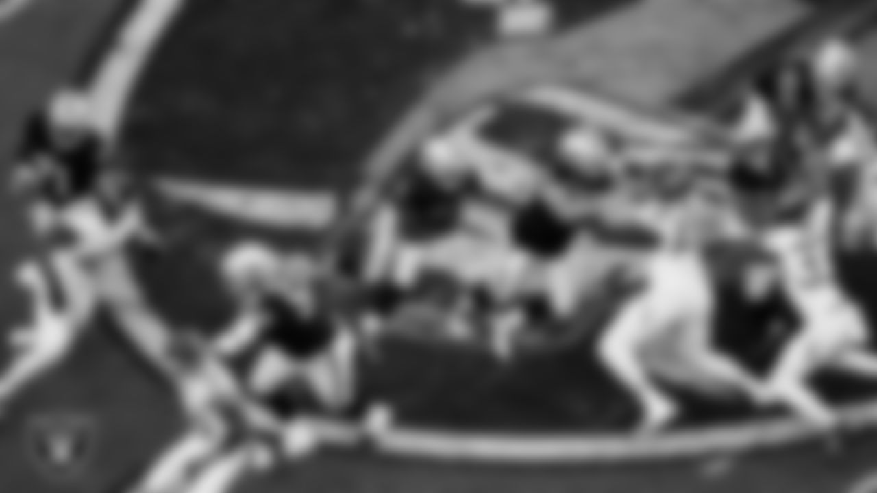 Las Vegas Raiders running back Ashton Jeanty (2) rushes during the regular season home game against the Tennessee Titans at Allegiant Stadium.