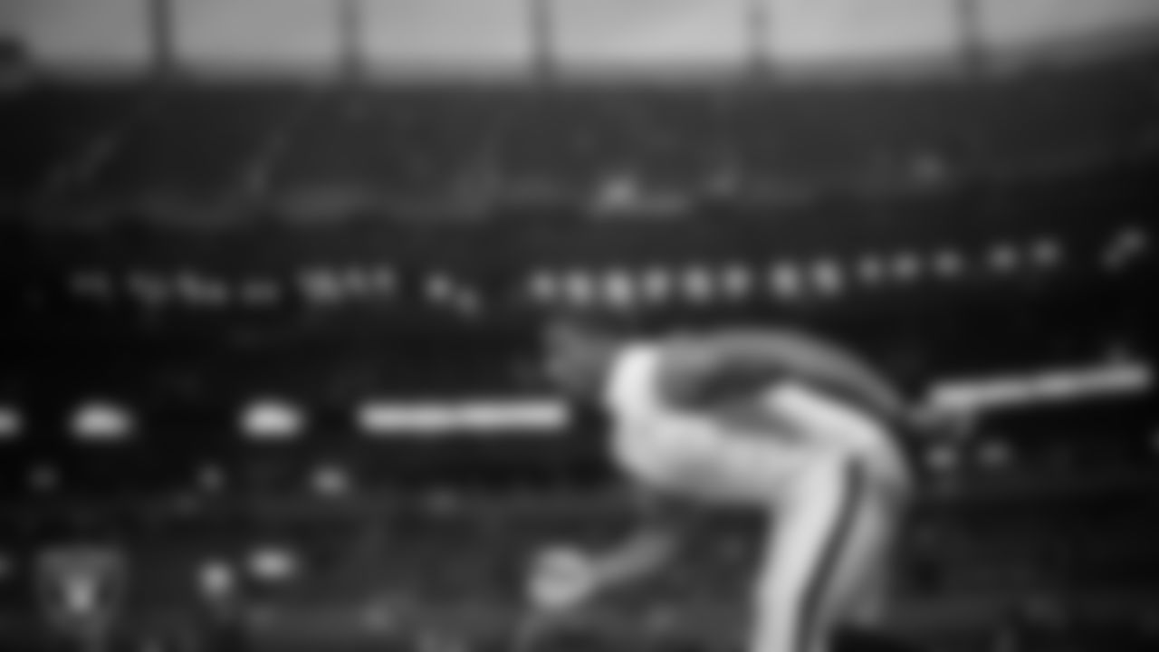 Las Vegas Raiders defensive tackle Thomas Booker IV (99) warming up before the regular season away game against the Denver Broncos at Empower Field at Mile High.