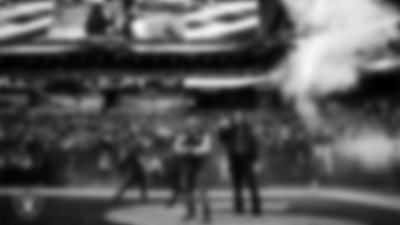 United States Navy veterans Joseph and Maryssa Ortiz are honored during a Salute to Service moment during the Las Vegas Raiders regular season home game against the New York Giants at Allegiant Stadium.