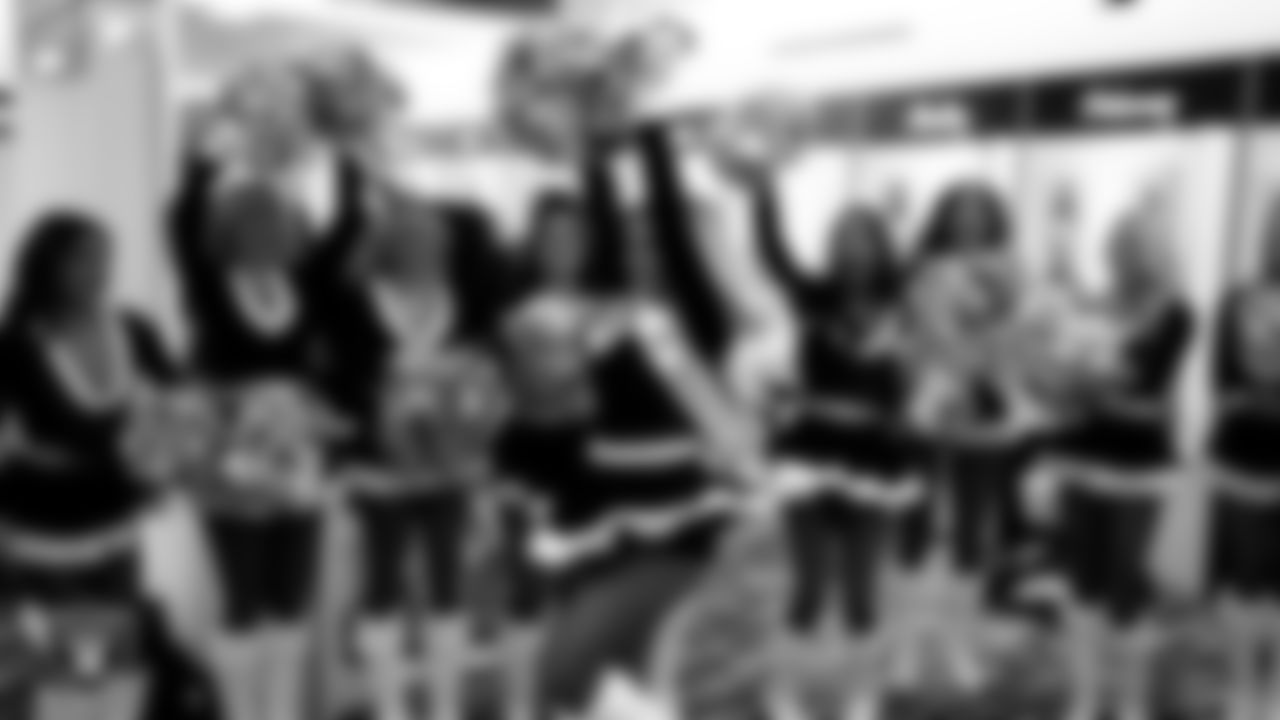 Raiderette Devyn is named Raiderette of the Game in the locker room before the regular season home game against the New York Giants at Allegiant Stadium.