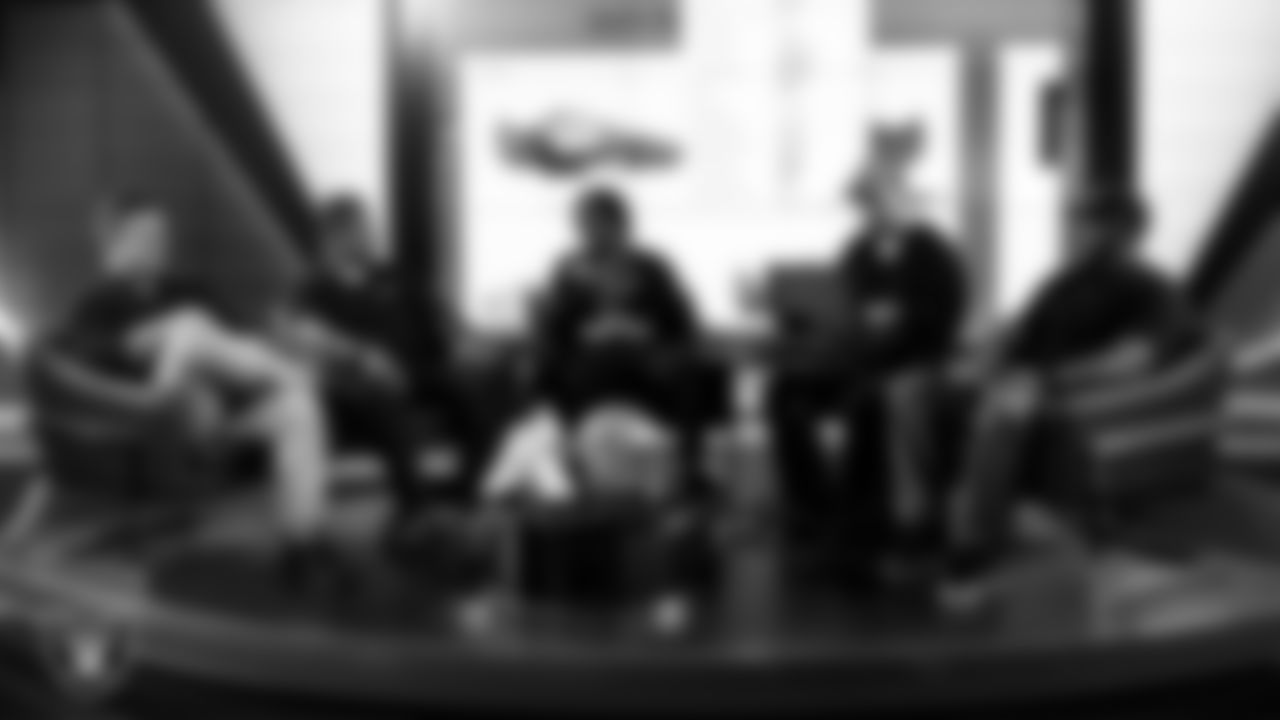 Las Vegas Raiders cornerback Darnay Holmes (30) works with representatives from Merging Vets and Players and designers to design cleats for My Cause My Cleats in Cox Studios at Intermountain Health Performance Center.