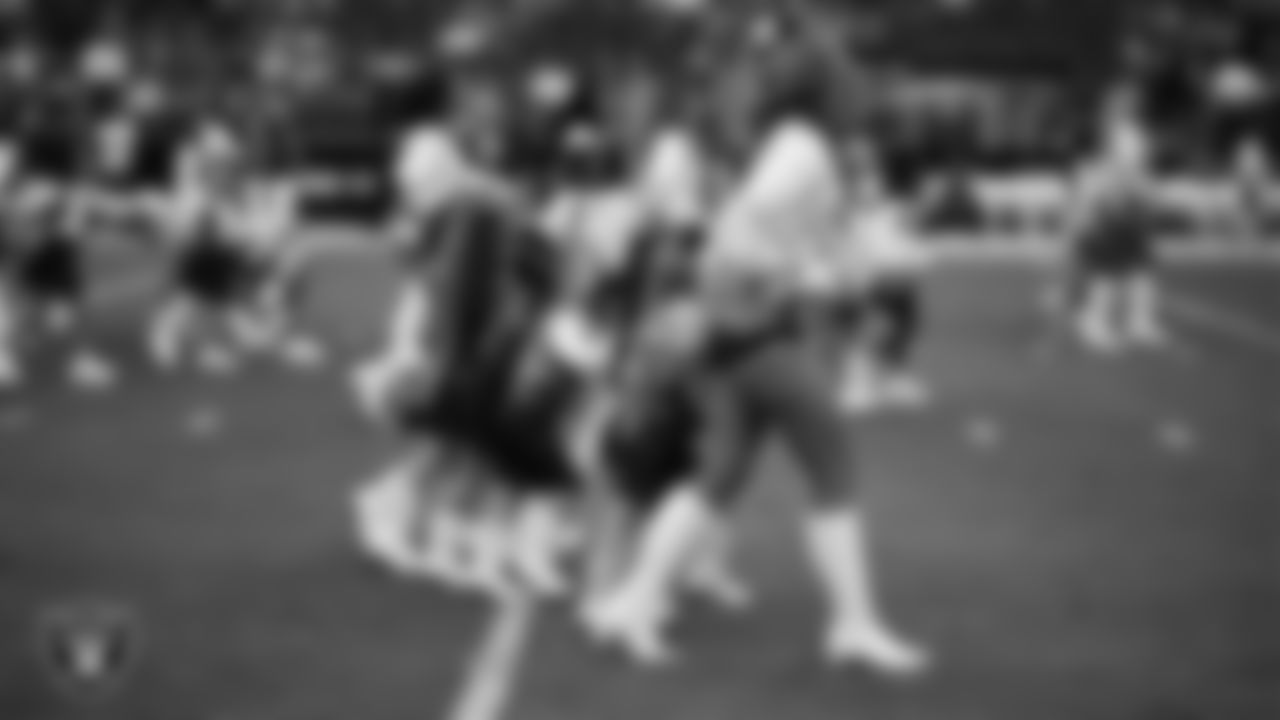 Raiderette Shelby and Junior Raiderettes enter the field for their performance on the field before the preseason home game against the San Francisco 49ers at Allegiant Stadium.