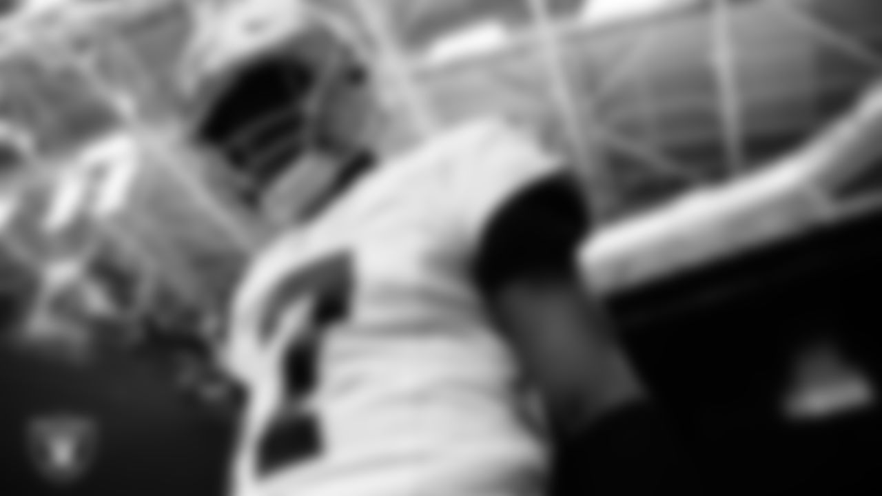 Las Vegas Raiders quarterback Geno Smith (7) walks down the tunnel before the preseason away game against the Seattle Seahawks at Lumen Field.