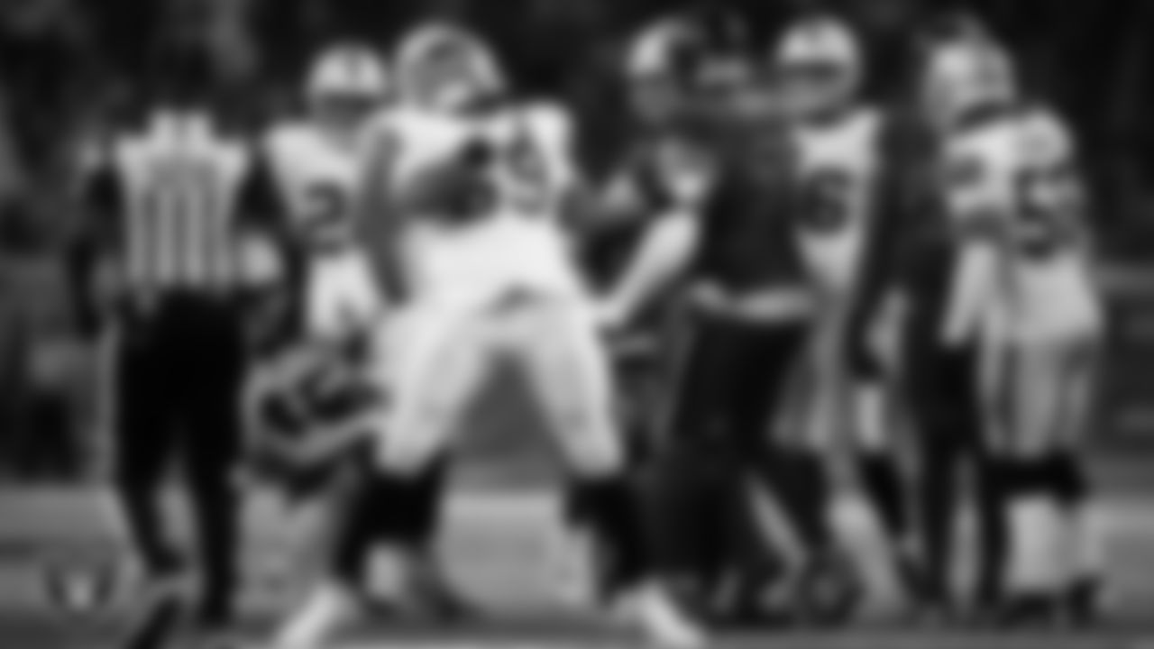 Las Vegas Raiders defensive tackle Adam Butler (69) celebrates after making a tackle during the regular season away game against the Houston Texans at NRG Stadium.