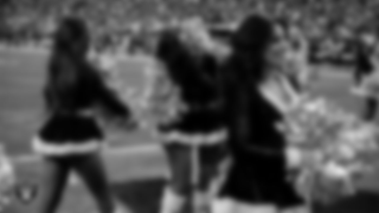 nRaiderette Amanda celebrates with Raiderette Taylor after being named Rookie of the Year during the regular season home game against the New York Giants at Allegiant Stadium.