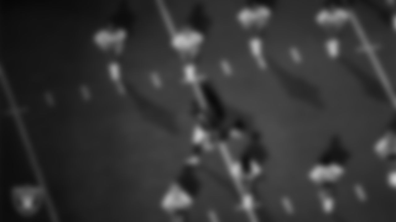 Las Vegas Raiders defensive tackle Thomas Booker IV (99) is introduced onto the field before the regular season home game against the Los Angeles Chargers at Allegiant Stadium.