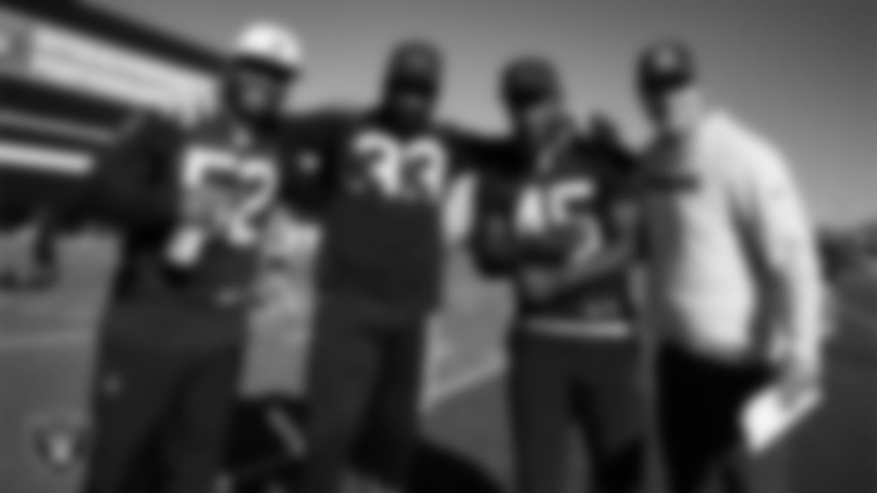 Las Vegas Raiders linebackers Elandon Roberts (52), Jamal Adams (33) and Devin White (45) and linebackers coach John Glenn during practice at Intermountain Health Performance Center.