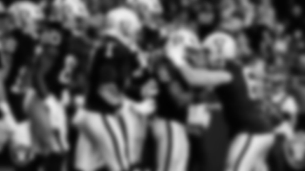Las Vegas Raiders running back Ashton Jeanty (2) celebrates with center/guard Jordan Meredith (61) after rushing for a 3-yard touchdown during the regular season home game against the Tennessee Titans at Allegiant Stadium.