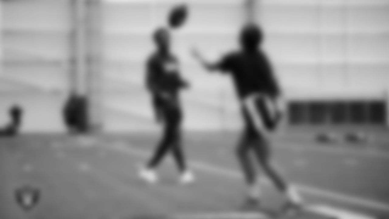 A member of the Jackson State University football team helps on a drill during a Raiders Junior Training Camp at Intermountain Health Performance Center.
