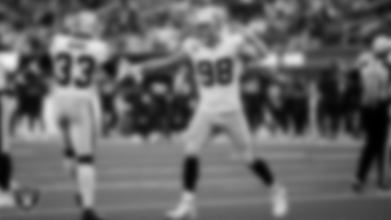 Las Vegas Raiders linebacker Jamal Adams (33) and defensive end Maxx Crosby (98) during the regular season away game against the Los Angeles Chargers at SoFi Stadium.