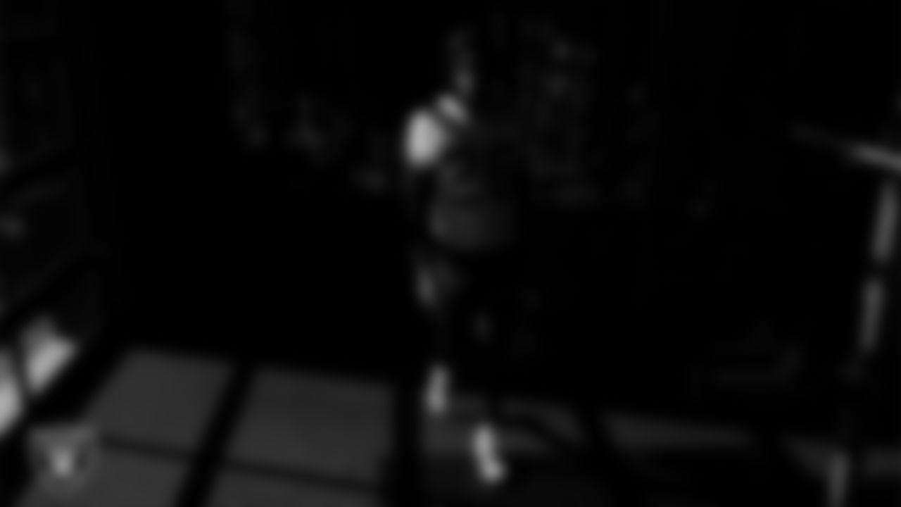 Las Vegas Raiders cornerback Darien Porter (26) walks out to the field for practice at Intermountain Health Performance Center.