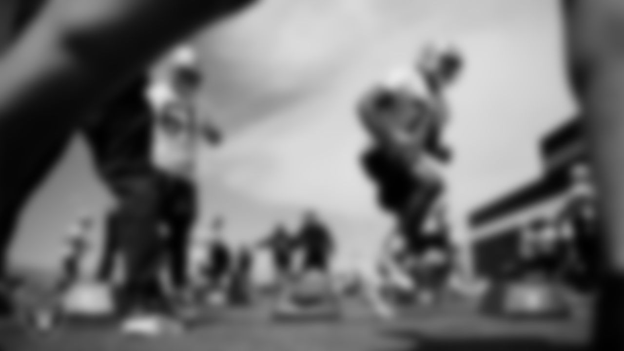 Las Vegas Raiders offensive lineman Jordan Meredith (61) and tackle DJ Glaze (71) at an Organized Team Activity (OTA) at Intermountain Health Performance Center.