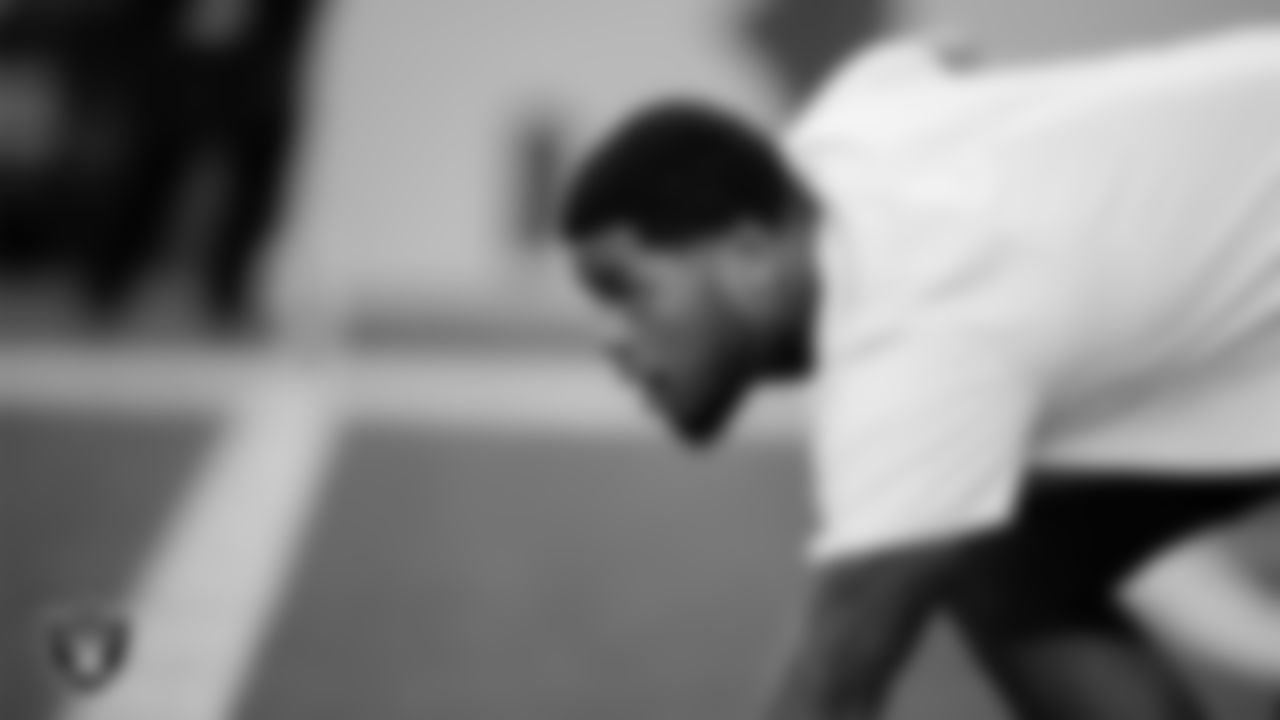 Las Vegas Raiders defensive tackle Jonah Laulu (96) warming up before the regular season away game against the Denver Broncos at Empower Field at Mile High.