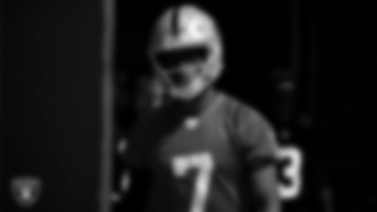 Las Vegas Raiders quarterback Geno Smith (7) walks out to the field for practice at Intermountain Health Performance Center.