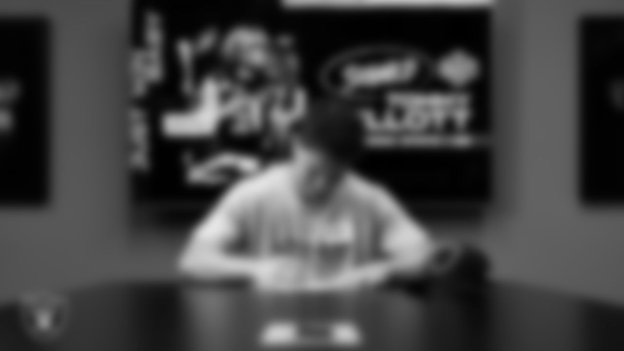 Rookie quarterback Tommy Mellott signs a contract with the Las Vegas Raiders at Las Vegas Raiders Headquarters.