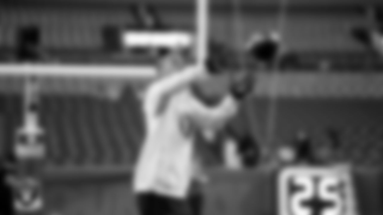 Las Vegas Raiders wide receiver Tyler Lockett (17) warming up before the regular season away game against the Denver Broncos at Empower Field at Mile High.