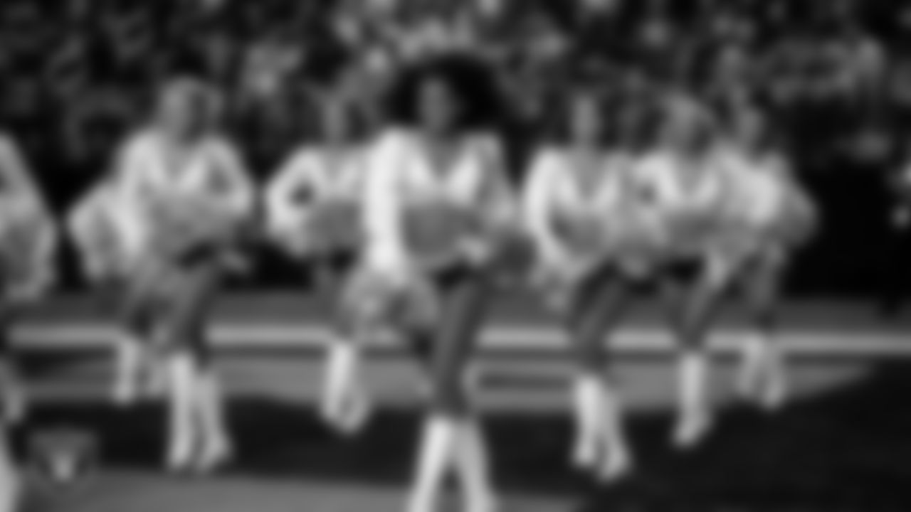 Raiderette Shayla walks onto the field for a performance during the regular season home game against the Jacksonville Jaguars at Allegiant Stadium.