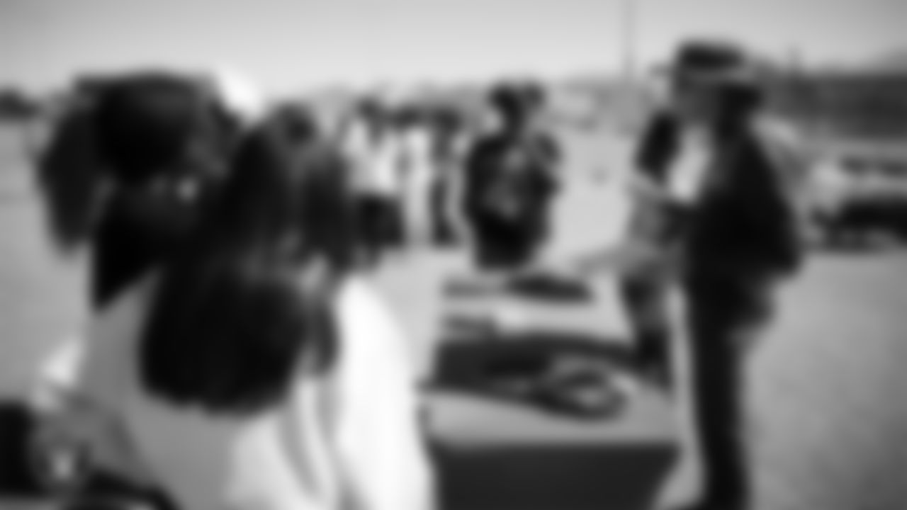 Students participate in activities while learning about flag football, nutrition and mental health during the R.U.S.H. program at J.D. Smith Middle School.