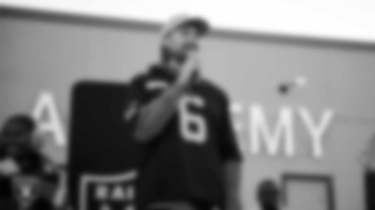 Las Vegas Raiders punter AJ Cole (6) speaks during the Raiders Holiday Salute at Nellis Air Force Base - Coral Academy.