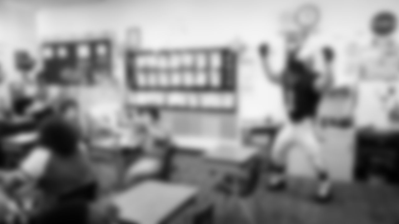 Raider Rusher visits a classroom during a 'Lil Raiders Pop-Up at Richard H. Bryan Elementary School.